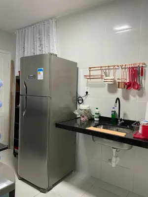 A cozinha ou kitchenette de Apartamento Mobiliado Temporada
