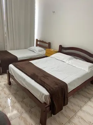 Uma cama ou camas num quarto em Apartamento Mobiliado Temporada