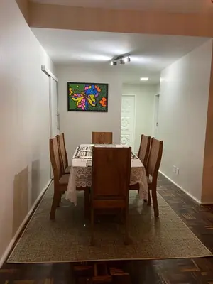 Uma área de estar em Apartamento Mobiliado Temporada