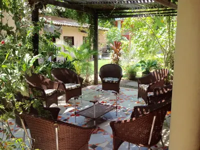 Um jardim no exterior de Hotel e Pousada Tropical Wind do Cumbuco