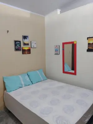 Uma cama ou camas num quarto em RECANTO DO BETERRABA