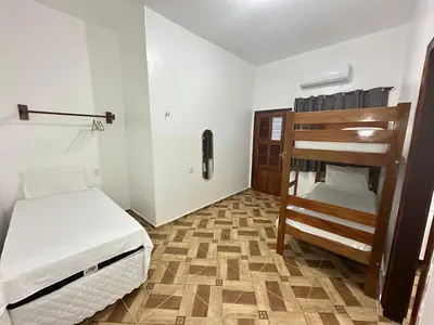 Uma cama ou camas num quarto em Morada da Praia Pousada