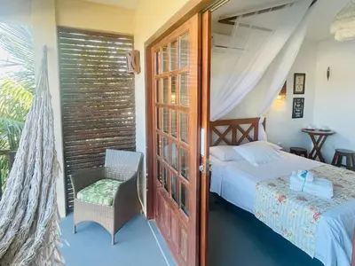 Uma cama ou camas num quarto em Recanto Maria Flor by Holiday Stays