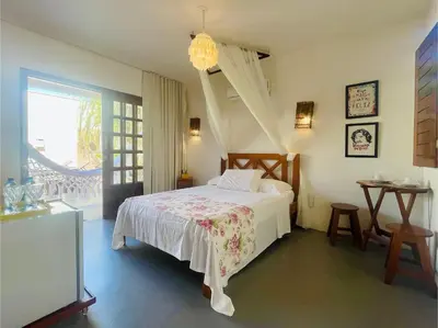 Uma cama ou camas num quarto em Recanto Maria Flor by Holiday Stays