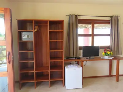 Uma televisão e/ou sistema de entretenimento em Pousada Red House