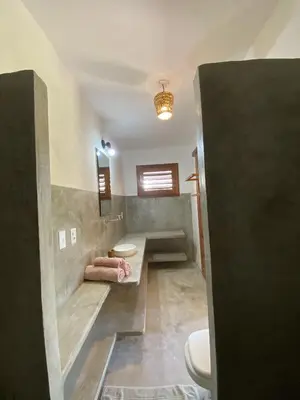 Uma casa de banho em Icarai Kite House