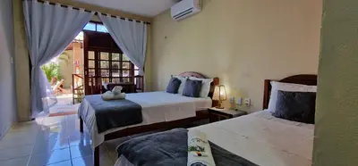 Uma cama ou camas num quarto em Hotel Pousada Sol & Lua