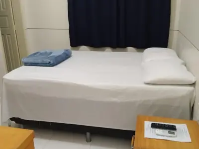 Uma cama ou camas num quarto em Hotel Villa Real
