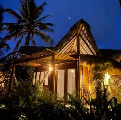 Um jardim no exterior de Pousada Casa das Rendas