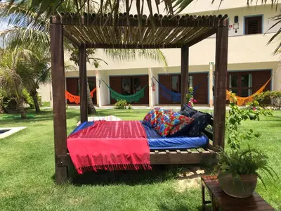 Um jardim no exterior de Hotel Pousada Blauset
