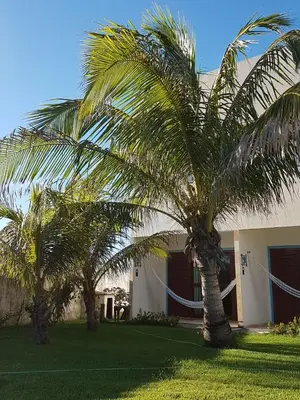 Um jardim no exterior de Hotel Pousada Blauset