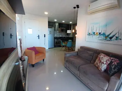 Uma área de estar em My Way Abolição Vista Mar by Escala Imóveis