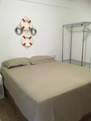 Uma cama ou camas num quarto em Pousada Casa da Adriana
