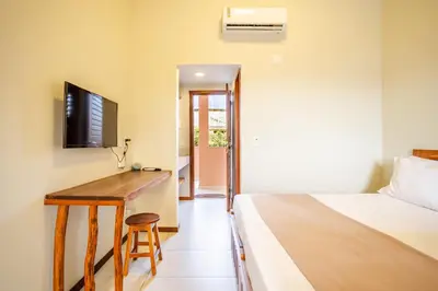 Uma televisão e/ou sistema de entretenimento em Villa das Palmeiras Jeri