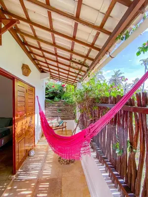 Uma varanda ou terraço em BEACH VILLA Camurupim