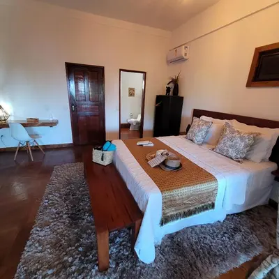 Uma cama ou camas num quarto em R.I.O