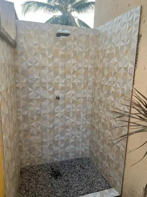 Uma casa de banho em AP 05 com Jacuzzi - Sol e Mar Residence Be Summer