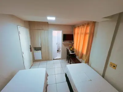 Uma cama ou camas num quarto em Hotel Visconde