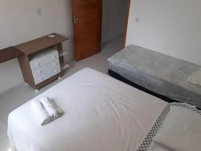 Uma cama ou camas num quarto em Barcelona Beach Residence