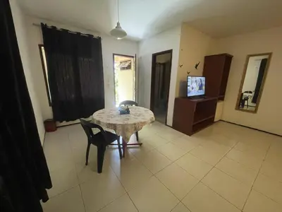 Uma televisão e/ou sistema de entretenimento em Cedros Pousada