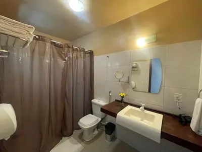 Uma casa de banho em Cedros Pousada