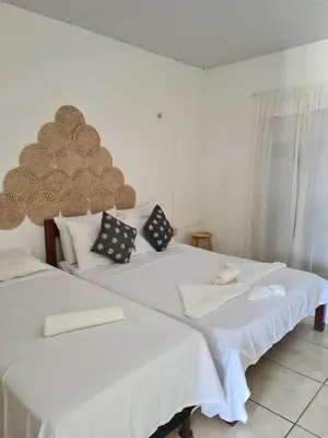 Uma cama ou camas num quarto em Pousada Brilho da Lua