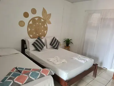 Uma cama ou camas num quarto em Pousada Brilho da Lua