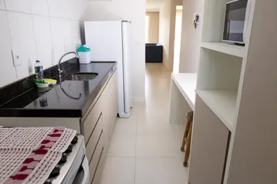A cozinha ou kitchenette de Golf Ville Resorts Suites