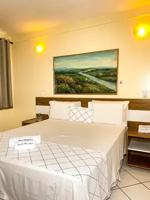 Uma cama ou camas num quarto em Hotel Monólitos