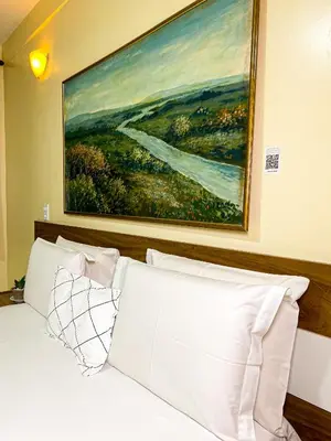 Uma cama ou camas num quarto em Hotel Monólitos