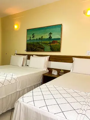 Uma cama ou camas num quarto em Hotel Monólitos