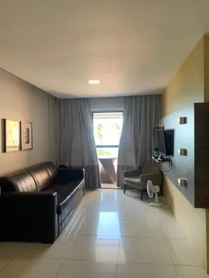Uma área de estar em Iracema Residence Flat - Apto Particular