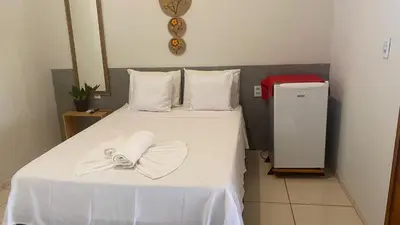 Uma cama ou camas num quarto em Beach Chalet Preá