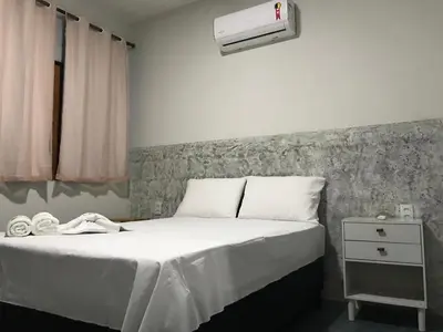 Uma cama ou camas num quarto em Beach Chalet Preá