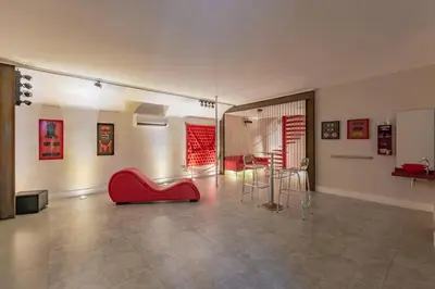 Uma área de estar em Spa urbano Motel Adult Only
