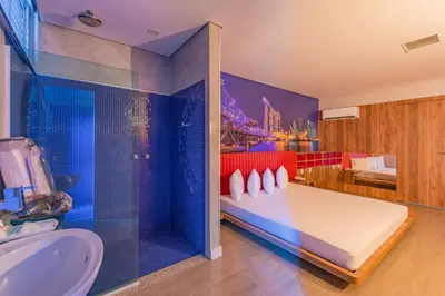 Uma cama ou camas num quarto em Spa urbano Motel Adult Only