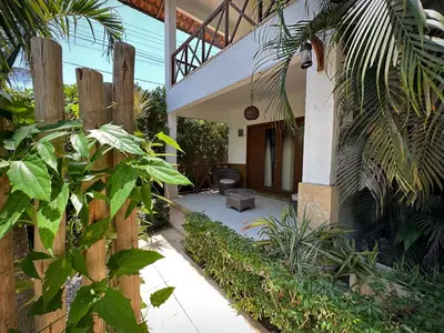 Um jardim no exterior de Pousada Oasis Paracuru