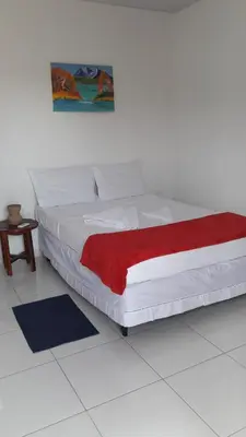 Uma cama ou camas num quarto em Villa Portal dos Ventos