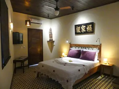 Uma cama ou camas num quarto em Pousada O Refúgio
