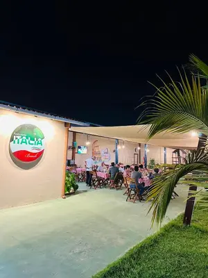 Um restaurante ou outro lugar para comer em Hotel & Pousada Italia Beach - Porto Das Dunas