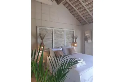 Uma cama ou camas num quarto em Apê Bossa Nova, aconchego e charme!