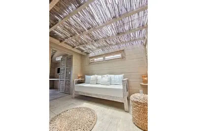 Uma cama ou camas num quarto em Apê Bossa Nova, aconchego e charme!