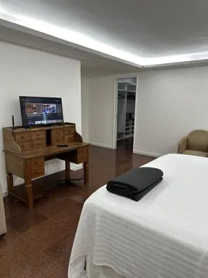 Uma televisão e/ou sistema de entretenimento em Solar Beach Front