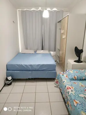 Uma cama ou camas num quarto em Porto das Dunas