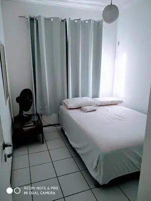 Uma cama ou camas num quarto em Porto das Dunas