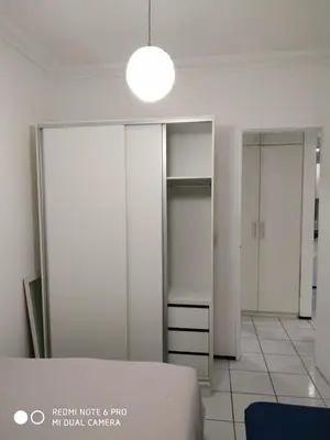 Uma cama ou camas num quarto em Porto das Dunas