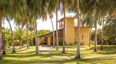 Um jardim no exterior de Refúgios Parajuru - Villa Cristiano