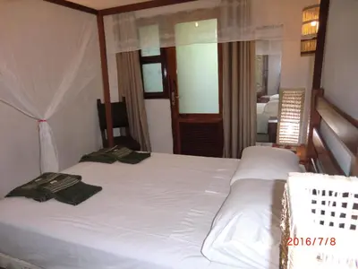 Uma cama ou camas num quarto em Pousada Yuste Beach Farm