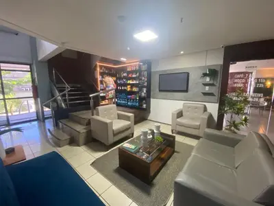 Uma televisão e/ou sistema de entretenimento em Hosts BR - Flat Vista Mar no Meireles