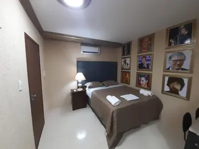 Uma cama ou camas num quarto em Hotel Nacional